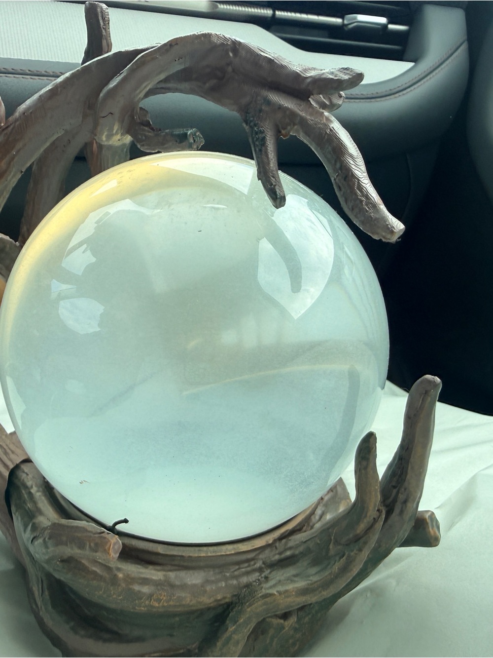 Handcrafted Frosted Glass Orb with Driftwood-Style Bronze Stand